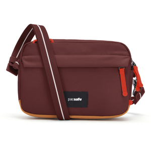 Small urban anti-theft bag Pacsafe Go - burgundy.