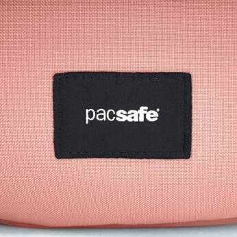 Folding women's anti-theft bag Pacsafe Go - pink.