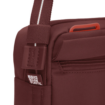 Small urban anti-theft bag Pacsafe Go - burgundy.