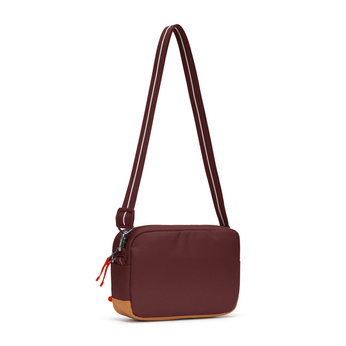 Small urban anti-theft bag Pacsafe Go - burgundy.