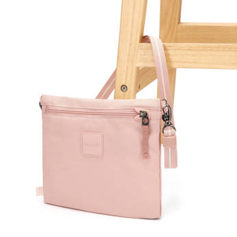 The Pacsafe GO anti-theft pouch bag - pink.